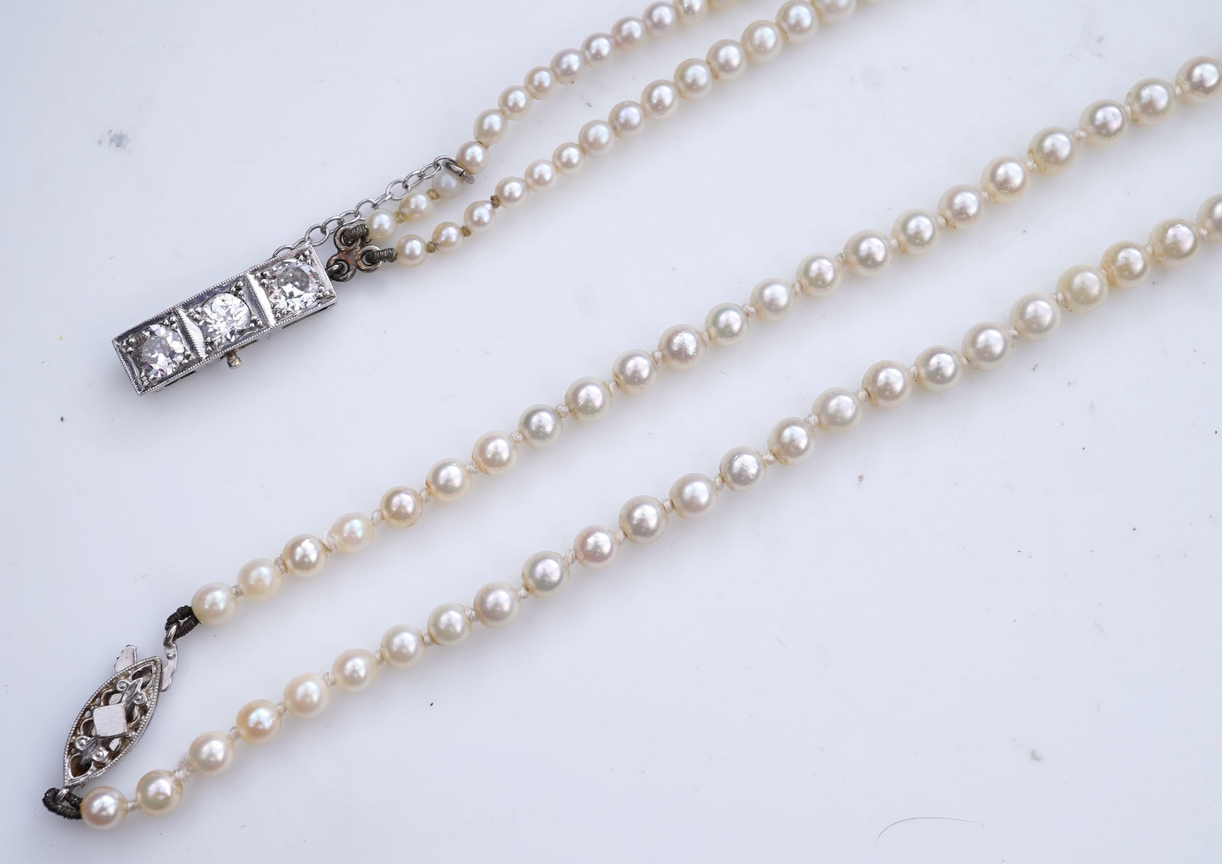 A cultured pearl and diamond necklace, early 20th century